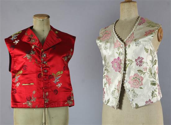 A collection of gentlemens decorative waistcoats, some plain, some patterned and striped, various sizes